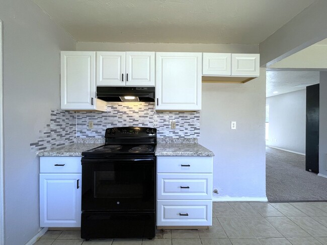 Building Photo - Welcome to this charming two-story single-...
