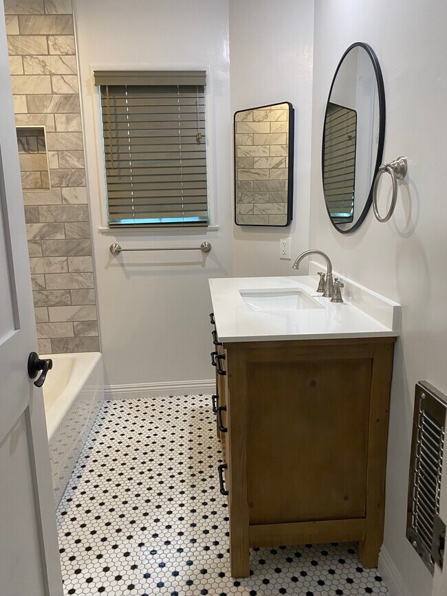 Custom tile floorwork - 700 S Louise St