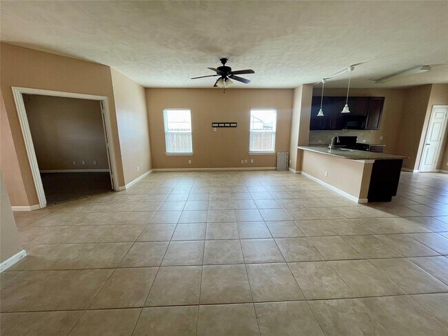 Building Photo - 10803 Woodwind Shadows Dr