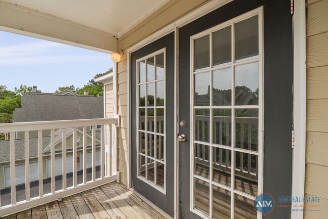 Building Photo - Bright, Freshly Updated 2BR/2BA Condo at T...