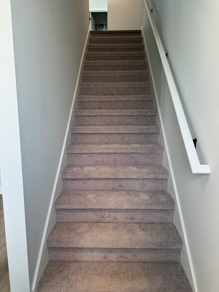 Staris going up to Kitchen/Dining Room - 813 Canterbury Ln