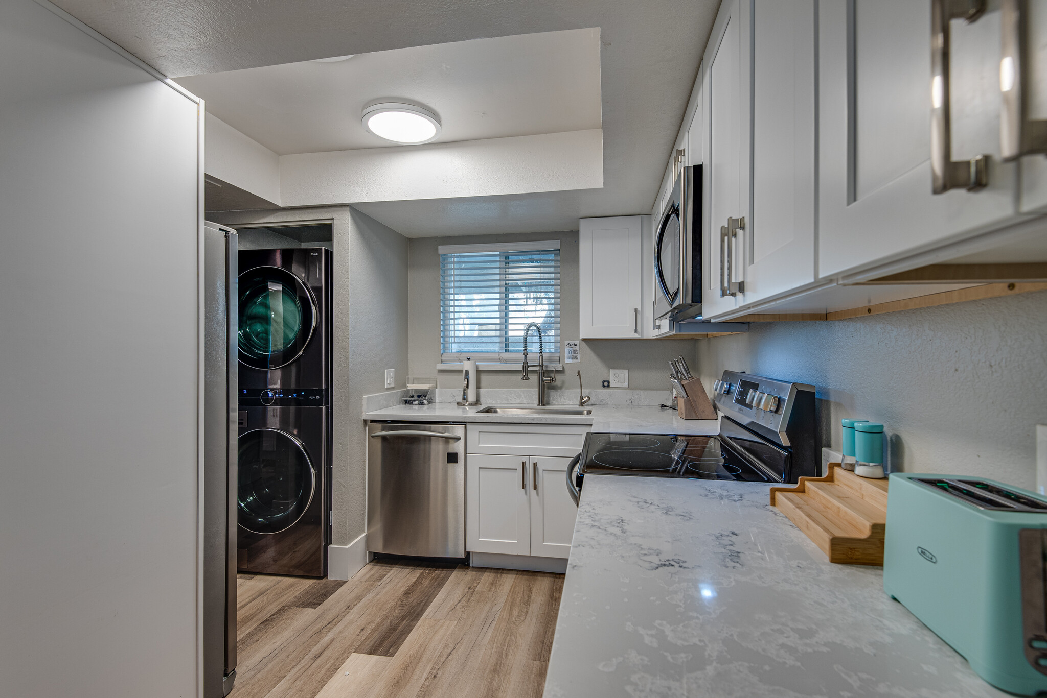 Kitchen is open and easy to serve. - 4150 E Cactus Rd