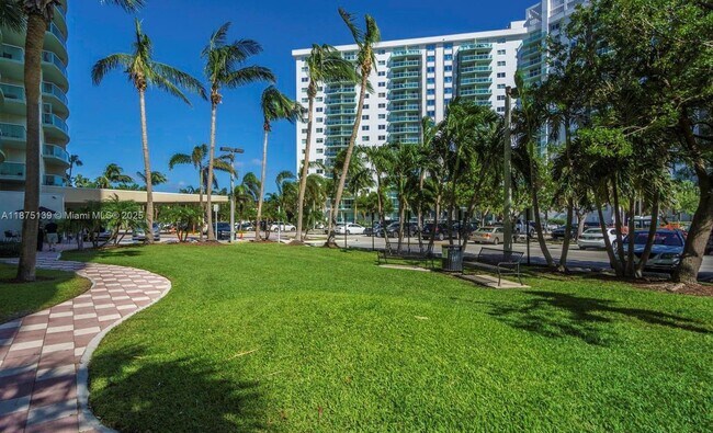 Building Photo - 19390 Collins Ave