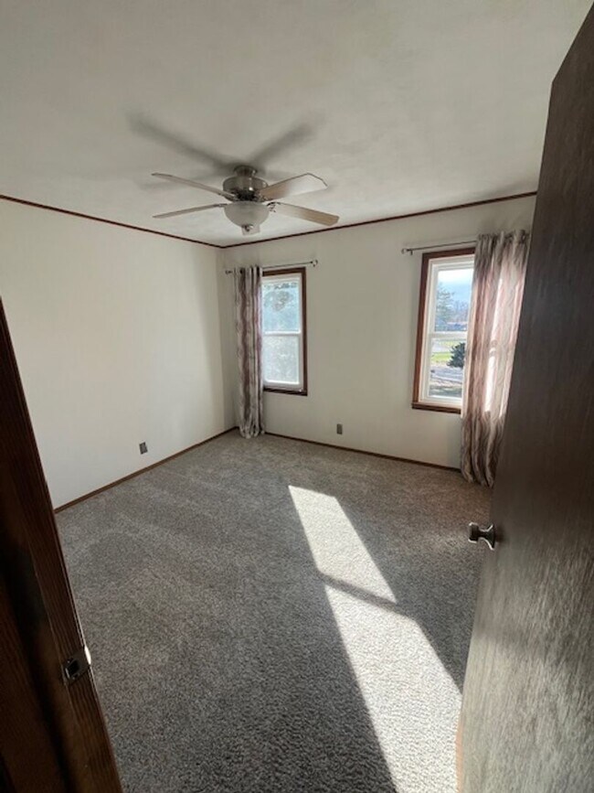 Building Photo - Spacious, Fully Updated Home with Walkout Basement on a Mature Lot