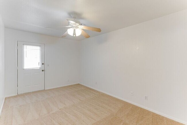 Building Photo - Charming 2 Bed, 2 Bath Condo with Fireplace & Balcony! 89011