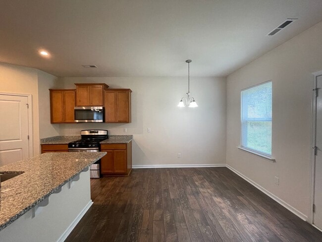 Building Photo - 4BR/3BA Home with Bedroom and Full Bath Downstairs Now Available In South Charlotte!