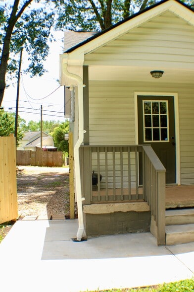 Exit from backyard through fence to side driveway - 311 Paris Mountain Ave