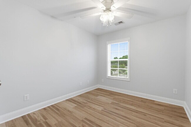 Building Photo - Now available, freshly painted with a community pool!