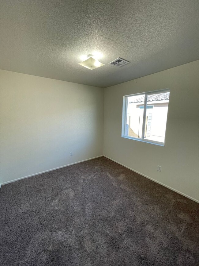 Building Photo - NEARLY NEW Home in the Desired Desert Sands Subdivision!