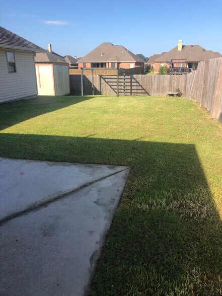 Backyard w/ Storage Building - 108 Smalley Rd