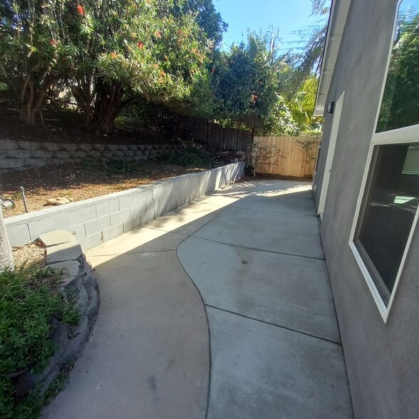 View of planter and patio in front of the home - 3640 Catalina Dr