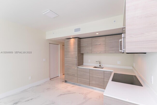 Building Photo - 1300 S Miami Ave