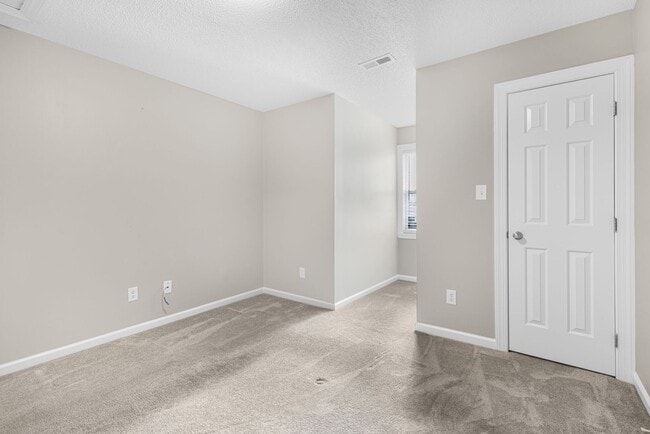 Building Photo - 3419 Pear Tree Court Unit A