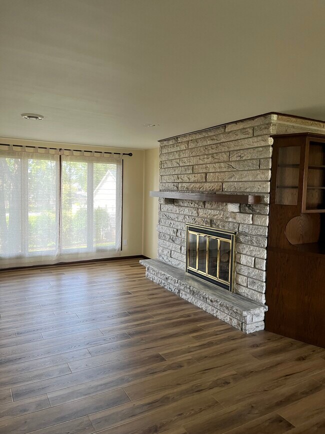 Dual-sided gas burning fireplace - 2790 S Ridge Rd