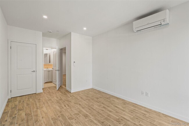 Building Photo - 213-41 38th Ave