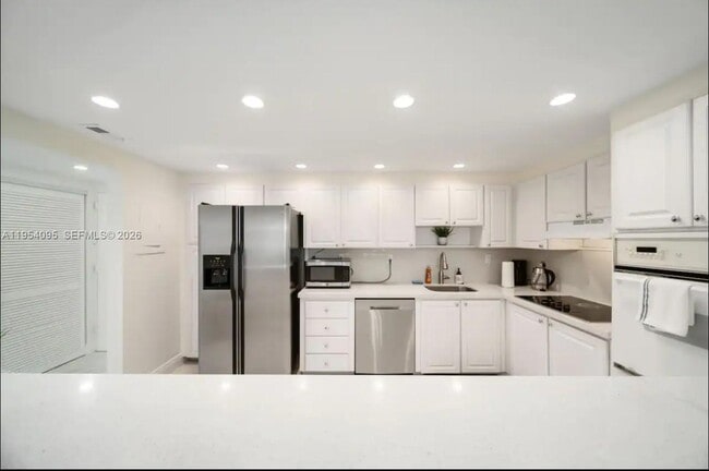 Building Photo - 19370 Collins Ave