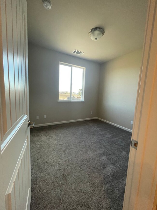 Building Photo - Four Bedroom, Two and a Half Bath Home