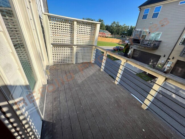 Building Photo - Elegant 3 Story 3 Bedroom Formal Model Tow...