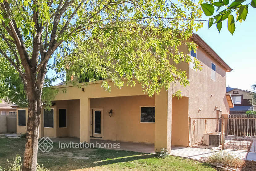 Building Photo - 8228 W Harmony Ln