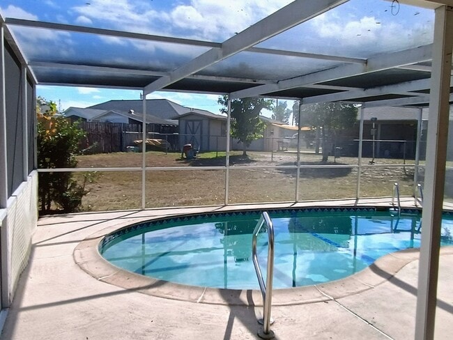Building Photo - Pool. Privacy. Perfect location. Available now!