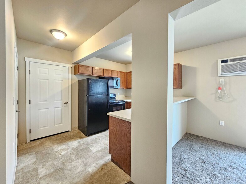 Building Photo - 5205 -5207  E. Upriver Dr.