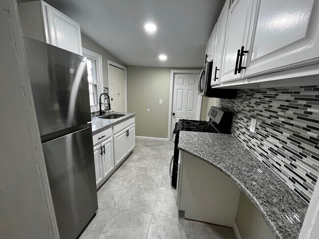 Building Photo - Renovated 2-Bedroom Home with Updated Kitchen & Backyard – Trenton NJ