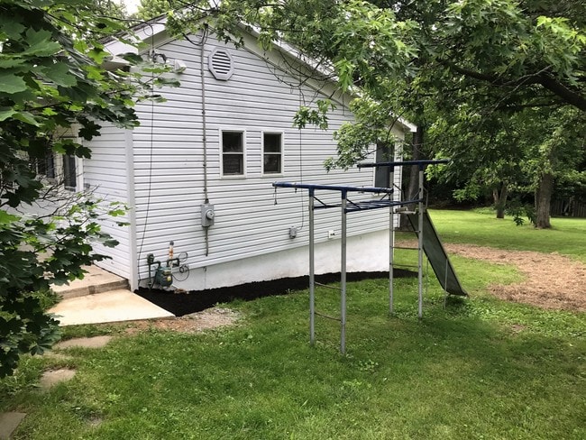 East side with swing set - 18 Mozart Ave