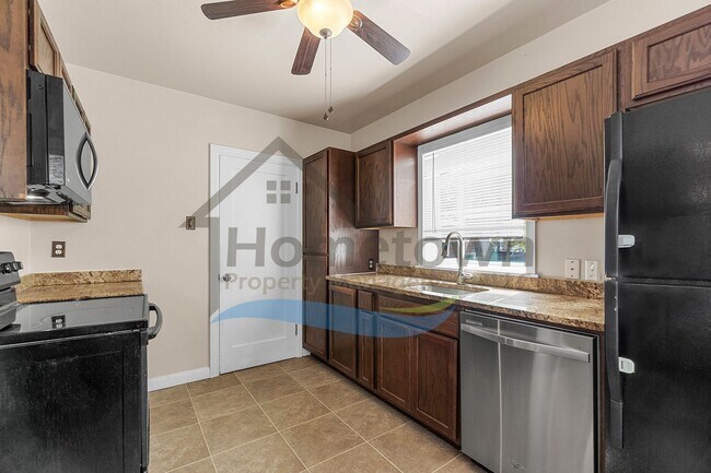 Building Photo - 4 Bedroom 2 Bathroom Home with a Fully Fen...