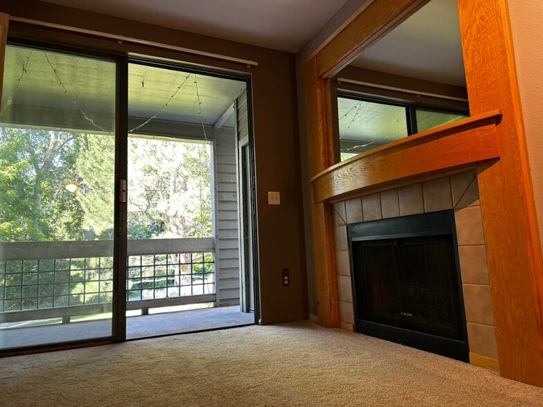 LIVING ROOM BALCONY & GAS FIREPLACE - 3260 47th St