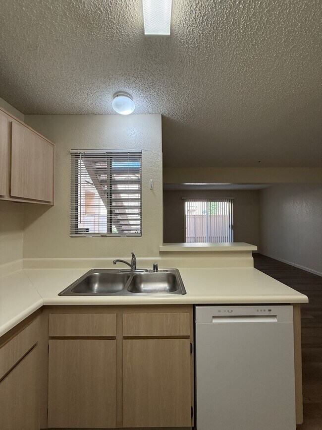 Building Photo - Downstairs Corner Condo in the Gated Community of Las Palmas