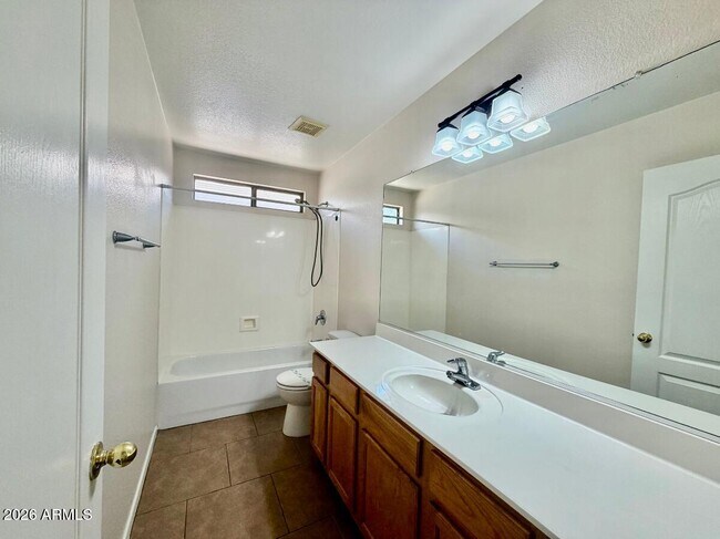 Building Photo - 9323 W Harmony Ln