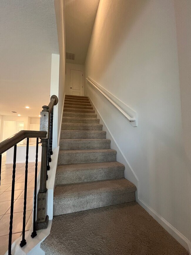 Building Photo - Town Home in The Trails -2 Primary Suites!!