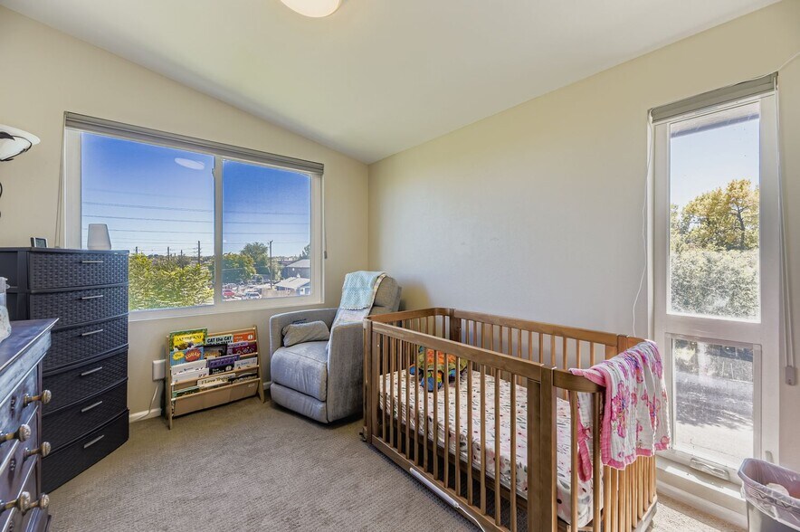 Bedroom 3 w/energy efficient windows & Denver skyline city views to the distant northeast - 1197 S Mariposa St