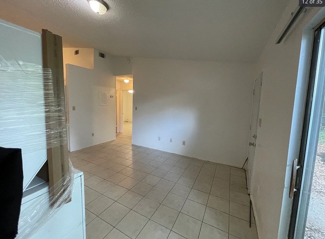 Building Photo - 6832 Tiki Ln