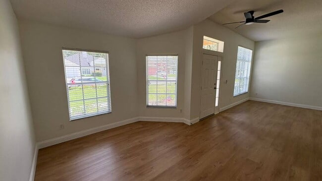 Building Photo - "Stunning 4-Bedroom Lake View Home in Oviedo – Spacious 2,132 Sq Ft Retreat!"