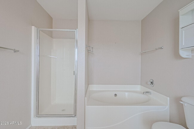 Building Photo - 15569 W Gelding Dr