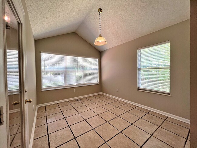 Building Photo - 6017 Tennyson Dr