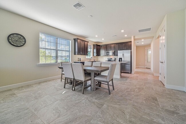 Building Photo - **Coach Home w/ Private Pool in Esplanade Lake Club **