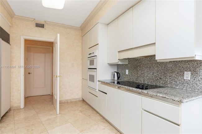 Building Photo - 9601 Collins Ave