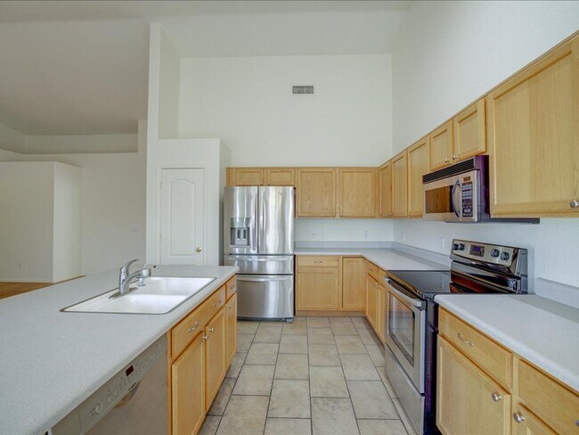 Building Photo - Ready Living: Solar Panels, EV Charging & Open-Concept Design!