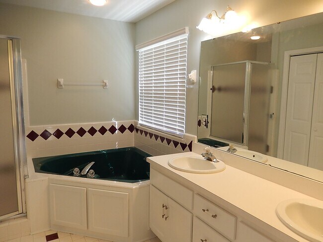 Building Photo - LOVELY 4/2.5 in Buck Lake Area on 1 Acre w/ 2 Car Garage, Washer/Dryer, Lawn Maint, & 2228 sq ft!...