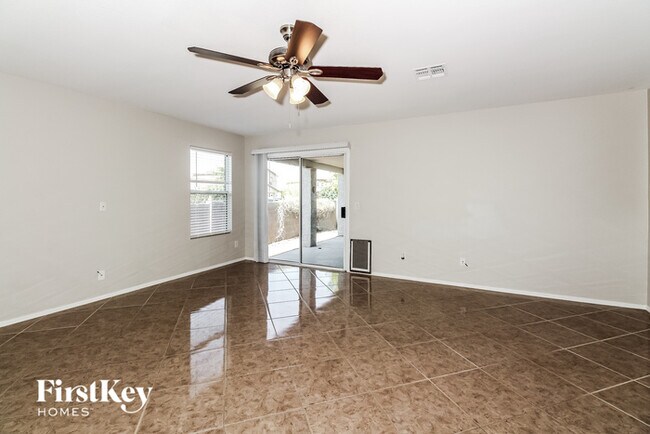 Building Photo - 9229 N Centipede Ave