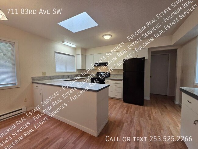 Building Photo - 711 83rd Ave SW