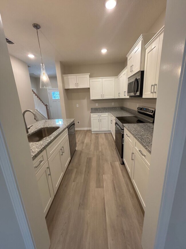 Building Photo - BRAND NEW 4 Bed 3.5 Bath Townhome Near The...