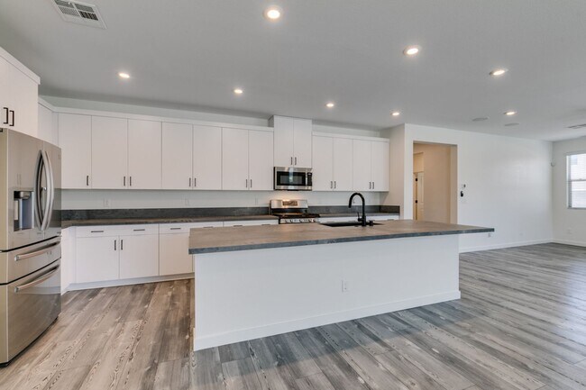 Building Photo - Spacious 4 Bedroom + Loft Tule Springs Home with Heated Pool & 3-Car Garage
