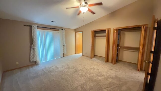 Building Photo - 4bd/3ba HUGE Home w/Hardwood Floors, Russian Fireplace, 2-Car Garage & Fenced Back Yard!