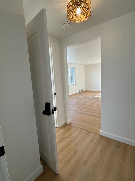 Hallway looking into livingroom - 249 Dunlop Ave