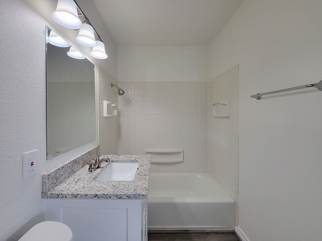 Building Photo - This fully renovated 3-bedroom, 2-bath home features a modern kitchen, large master suite with a ...