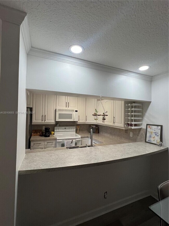 Building Photo - 3357 Cocoplum Cir