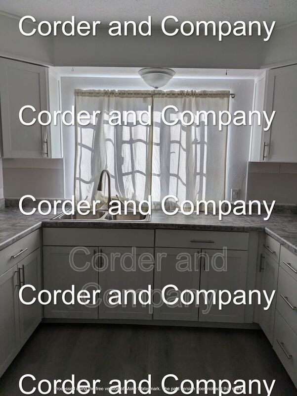 Building Photo - 211-1211 Adams St NE